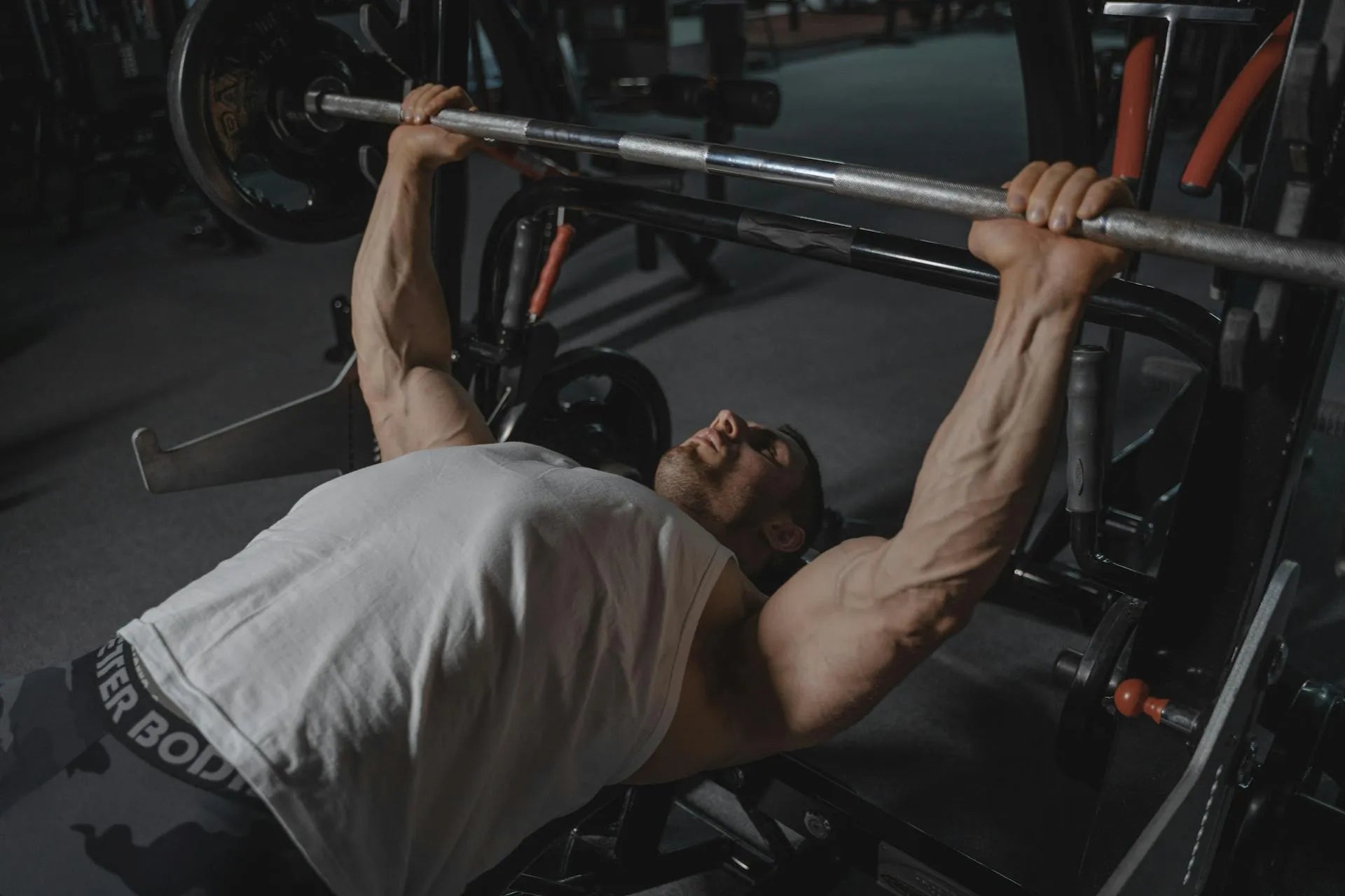 a man lifting a barbell