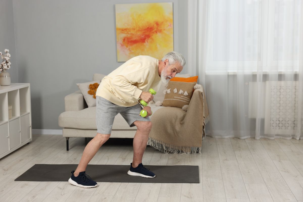 Senior man exercising to improve gut health and overall wellness.