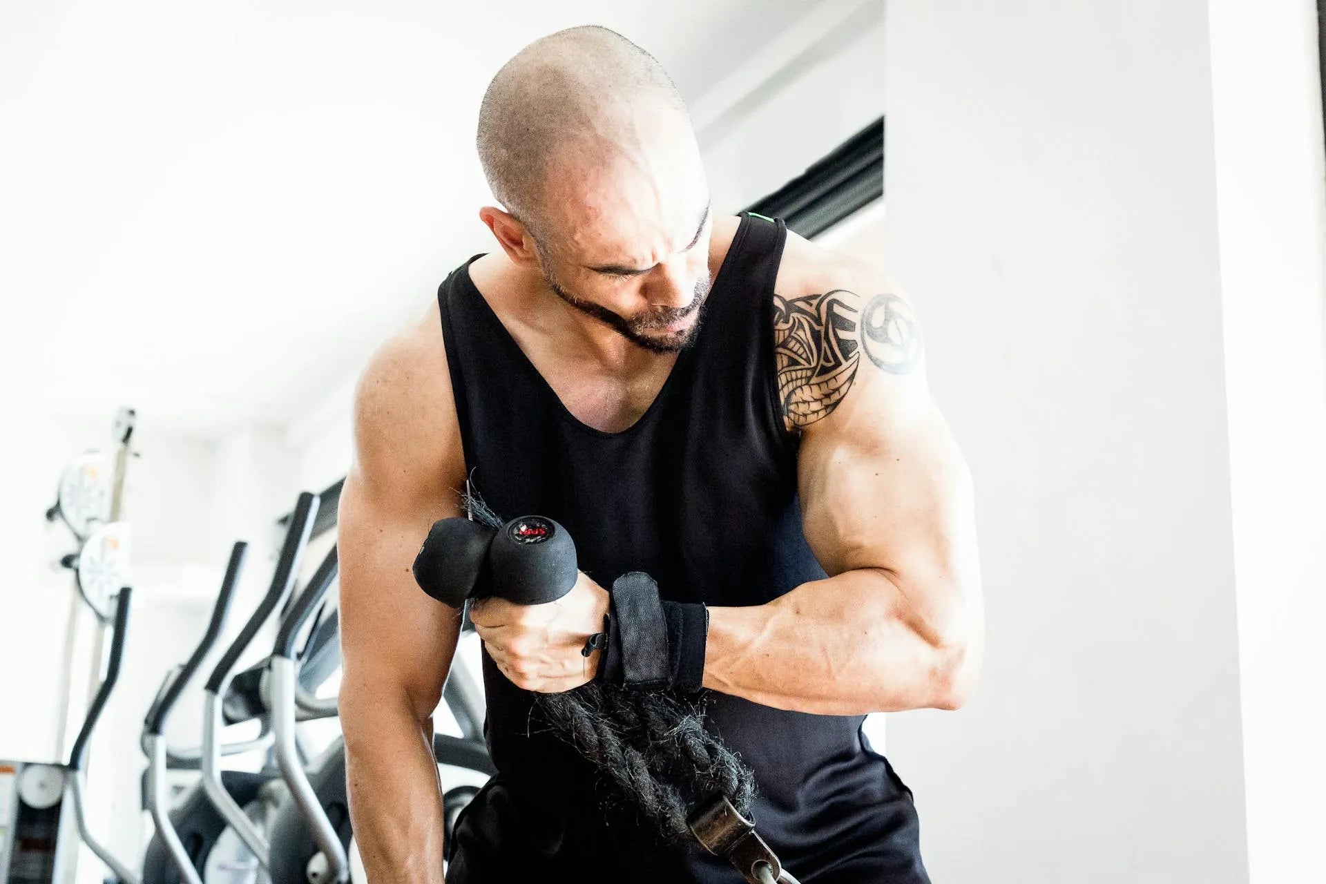 a man lifting a dumbell